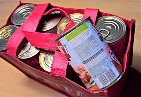 Canned food in tote bag. 