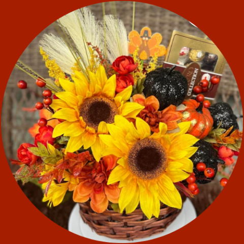 Fall Floral Arrangment with Sunflowers and pumpkins. 