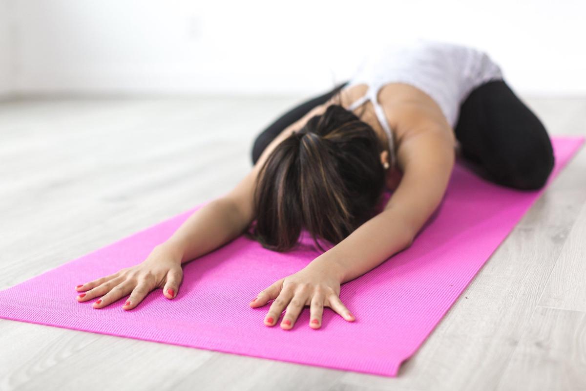 Woman in yoga pose. 