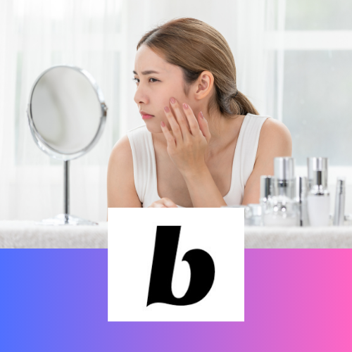 Woman looking at face in mirror with makeup beside her. Beautycounter logo below. 